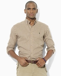 A preppy madras pattern enlivens a classic-fitting sport shirt, tailored from soft cotton twill for comfortable style. A preppy madras pattern enlivens a classic-fitting sport shirt, tailored from soft cotton twill for comfortable style.