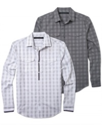 Sean John takes traditional dobby weave cotton and makes it the stuff of an untraditional sports shirt with double chest pockets and placed stripe accents. Sean John takes traditional dobby weave cotton and makes it the stuff of an untraditional sports shirt with double chest pockets and placed stripe accents.