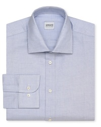 Get a fresh start with this clean, crisp cotton dress shirt from Armani Collezioni, tailored for a modern silhouette. Get a fresh start with this clean, crisp cotton dress shirt from Armani Collezioni, tailored for a modern silhouette.