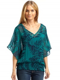 THE LOOKBold fossil print on sheer chiffonV-neckKimono sleevesSmocked waistbandIncludes solid camisoleTHE FITAbout 24 from shoulder to hemTHE MATERIALPolyesterContrast: rayon/spandexCARE & ORIGINDry cleanMade in USAModel shown is 5'8 (172½cm) wearing US size Small. THE LOOKBold fossil print on sheer chiffonV-neckKimono sleevesSmocked waistbandIncludes solid camisoleTHE FITAbout 24 from shoulder to hemTHE MATERIALPolyesterContrast: rayon/spandexCARE & ORIGINDry cleanMade in USAModel shown is 5'8 (172½cm) wearing US size Small.