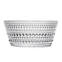 This clear glass bowl has recently been reissued by the well-known Finnish design house Iittala. Designed in 1964 by Oiva Toikka, it features concentric circles of glass dewdrops for a look that's both lovely and dazzling. It's an excellent serving bowl for a special event.