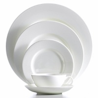 Anmut will be the choice for purists; it is an undecorated white that beautifully shows off the glamorous forms and quality bone china. Dishwasher and microwave safe.