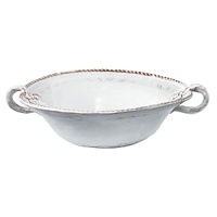 This Vietri serving bowl was crafted by hand in Tuscany of durable, textural terra cotta for an irresistibly warm appeal. Ornament rolls are used to create its ornate designs. This Vietri serving bowl was crafted by hand in Tuscany of durable, textural terra cotta for an irresistibly warm appeal. Ornament rolls are used to create its ornate designs.