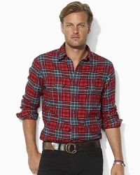 Putting a preppy twist on a conventionally rugged look, this relaxed-fitting plaid shirt is rendered in soft cotton with Ralph Lauren's embroidered pony adorning the chest. Putting a preppy twist on a conventionally rugged look, this relaxed-fitting plaid shirt is rendered in soft cotton with Ralph Lauren's embroidered pony adorning the chest.
