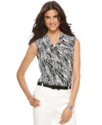 Outfit yourself in this striking tank top from Jones New York, featuring an allover abstract print and chic twist detail at the neckline. It's a brilliant match with white trousers! Outfit yourself in this striking tank top from Jones New York, featuring an allover abstract print and chic twist detail at the neckline. It's a brilliant match with white trousers!