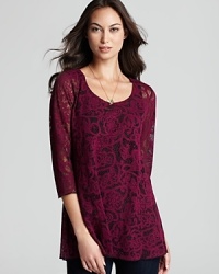 Lined with a seamless lockstitched shapewear tank to slim the figure, this Miraclebody by Miraclesuit tunic ushers in a romantic style sense with a sheer lace overlay. Lined with a seamless lockstitched shapewear tank to slim the figure, this Miraclebody by Miraclesuit tunic ushers in a romantic style sense with a sheer lace overlay.