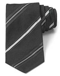 Spruce up your attire with a striking stripe tie in pure Italian silk. Spruce up your attire with a striking stripe tie in pure Italian silk.
