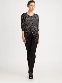 Finespun wool is adorned with a polished leopard print.V-neckLong sleevesButton frontAbout 30 from shoulder to hemWoolDry cleanMade in Italy of imported fabric Model shown is 5'10 wearing US size 4. Finespun wool is adorned with a polished leopard print.V-neckLong sleevesButton frontAbout 30 from shoulder to hemWoolDry cleanMade in Italy of imported fabric Model shown is 5'10 wearing US size 4.