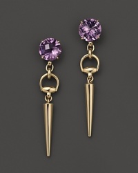 At once edgy and glamorous, these 18K yellow gold Gucci earrings show off a spiked shape accented with amethyst. At once edgy and glamorous, these 18K yellow gold Gucci earrings show off a spiked shape accented with amethyst.