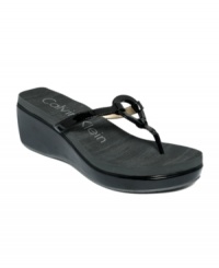 The Willow EVA platform thong sandals by Calvin Klein take casual to chic. A comfortable choice for a striking finishing touch. The Willow EVA platform thong sandals by Calvin Klein take casual to chic. A comfortable choice for a striking finishing touch.