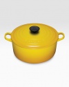 Crafted from heavy stoneware, Le Creuset cookware is the ultimate ingredient for chefs and home cooks worldwide. With its recessed-edge lid, this enameled cast iron oven masters slow cooking, evenly distributing and retaining heat.