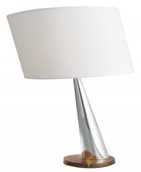 Polished but playful, the Wind table lamp mixes rich wood with polished metal in signature Nambe style. Lean it on an end table or console for a touch of whimsy. Polished but playful, the Wind table lamp mixes rich wood with polished metal in signature Nambe style. Lean it on an end table or console for a touch of whimsy.