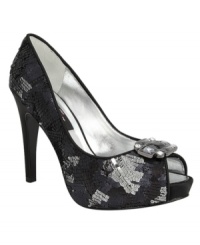 An array of multicolored sequins plus a jeweled detail on the vamp equals a glittering, glamorous evening look. We suggest pairing Nina's Evan peep-toe pumps with a simple LBD--let the shoes steal the show! An array of multicolored sequins plus a jeweled detail on the vamp equals a glittering, glamorous evening look. We suggest pairing Nina's Evan peep-toe pumps with a simple LBD--let the shoes steal the show!