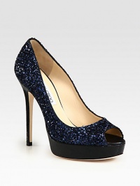 Shimmering peep toe silhouette of glittery fabric on an embossed leather platform and heel. Embossed leather heel, 5 (125mm)Embossed leather platform, ¾ (20mm)Compares to a 4¼ heel (110mm)Glitter-coated fabric upperPeep toeLeather lining and solePadded insoleMade in Italy Shimmering peep toe silhouette of glittery fabric on an embossed leather platform and heel. Embossed leather heel, 5 (125mm)Embossed leather platform, ¾ (20mm)Compares to a 4¼ heel (110mm)Glitter-coated fabric upperPeep toeLeather lining and solePadded insoleMade in Italy