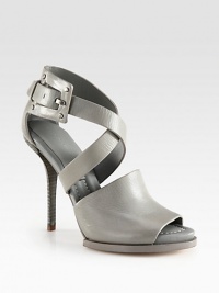 Nail your look with this monochromatic silhouette of buttery leather with an adjustable ankle strap and stacked heel. Stacked heel, 5 (125mm)Leather upperAdjustable ankle strapLeather lining and solePadded insoleImported Nail your look with this monochromatic silhouette of buttery leather with an adjustable ankle strap and stacked heel. Stacked heel, 5 (125mm)Leather upperAdjustable ankle strapLeather lining and solePadded insoleImported