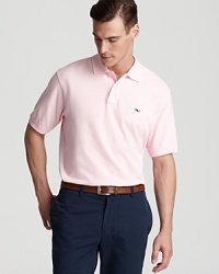 A classic pique polo features signature whale embroidery. From Vineyard Vines. A classic pique polo features signature whale embroidery. From Vineyard Vines.
