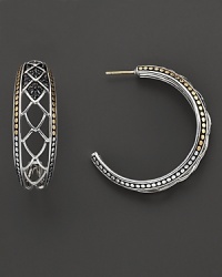 An elegant offering from John Hardy, the Naga hoop earring blends gold and silver, rendered with filigree cutout detail. Designed by John Hardy. An elegant offering from John Hardy, the Naga hoop earring blends gold and silver, rendered with filigree cutout detail. Designed by John Hardy.