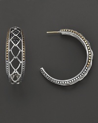 An elegant offering from John Hardy, the Naga hoop earring blends gold and silver, rendered with filigree cutout detail. Designed by John Hardy.