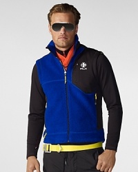 Setting the standard for stylish performance wear, this supremely soft vest is designed with bold color-blocking and stretch microfiber panels. Setting the standard for stylish performance wear, this supremely soft vest is designed with bold color-blocking and stretch microfiber panels.