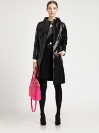 Crafted from a crinkly faux leather fabric, this fashion-savvy staple has a chic funnelneck, single-breasted front and slimming fit.FunnelneckLong sleevesFront snap closureSide slash pocketsAbout 38 from shoulders to hemCotton/polyurethaneDry cleanMade in the USA of imported fabricSIZE & FITModel shown is 5'10 (177cm) wearing US size 4. Crafted from a crinkly faux leather fabric, this fashion-savvy staple has a chic funnelneck, single-breasted front and slimming fit.FunnelneckLong sleevesFront snap closureSide slash pocketsAbout 38 from shoulders to hemCotton/polyurethaneDry cleanMade in the USA of imported fabricSIZE & FITModel shown is 5'10 (177cm) wearing US size 4.