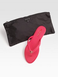 Rubber slip-on with logo detail and matching nylon cosmetic bag.Rubber sole ImportedOUR FIT MODEL RECOMMENDS ordering true whole size; ½ sizes should order the next whole size up. Rubber slip-on with logo detail and matching nylon cosmetic bag.Rubber sole ImportedOUR FIT MODEL RECOMMENDS ordering true whole size; ½ sizes should order the next whole size up.