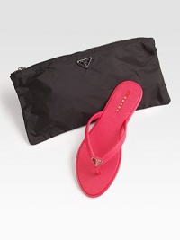 Rubber slip-on with logo detail and matching nylon cosmetic bag.Rubber sole ImportedOUR FIT MODEL RECOMMENDS ordering true whole size; ½ sizes should order the next whole size up. 