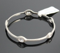 B. Brilliant Brushed Sterling Silver Bangle Bracelet with Small Oval Checkerboard Cut Cubic Zirconia B. Brilliant Brushed Sterling Silver Bangle Bracelet with Small Oval Checkerboard Cut Cubic Zirconia