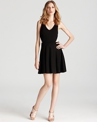 Mesh details at the waist give an alluring look to a fit & flare dress from ERIN Erin Fetherston. Mesh details at the waist give an alluring look to a fit & flare dress from ERIN Erin Fetherston.