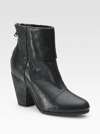Glimmering leather style with a chunky heel, back zipper and unique fold-over detail. Stacked heel, 3½ (90mm)Leather upperBack zipperLeather lining and solePadded insoleImportedOUR FIT MODEL RECOMMENDS ordering true whole size; ½ sizes should order the next whole size up.