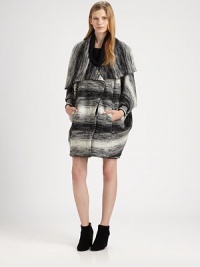 Oversized coat in a wool-rich blend with poncho-inspired styling and a degraded stripe pattern. Oversized funnel collarButton frontLong poncho sleevesSlash pocketsAbout 34 from shoulder to hem78% wool/22% polyesterDry cleanMade in USA of Italian fabricModel shown is 5'10 (177cm) wearing US size 4. Oversized coat in a wool-rich blend with poncho-inspired styling and a degraded stripe pattern. Oversized funnel collarButton frontLong poncho sleevesSlash pocketsAbout 34 from shoulder to hem78% wool/22% polyesterDry cleanMade in USA of Italian fabricModel shown is 5'10 (177cm) wearing US size 4.