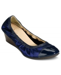 The Milly wedges by Cole Haan are chic and sophisticated with patent leather shine and the hidden comfort of Nike AIR technology. The Milly wedges by Cole Haan are chic and sophisticated with patent leather shine and the hidden comfort of Nike AIR technology.