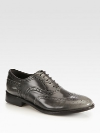 A traditional wingtip and perforated details top this burnished leather favorite with a subtle hint of sheen. Stacked heel, 1¼ (30mm)Leather upperLeather liningLeather and rubber solePadded insoleMade in Italy A traditional wingtip and perforated details top this burnished leather favorite with a subtle hint of sheen. Stacked heel, 1¼ (30mm)Leather upperLeather liningLeather and rubber solePadded insoleMade in Italy
