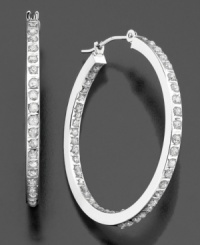 Dazzling diamond accents line these brilliant hoop earrings inside and out. Crafted in 14k white gold. Approximate diameter: 1 inch. Dazzling diamond accents line these brilliant hoop earrings inside and out. Crafted in 14k white gold. Approximate diameter: 1 inch.