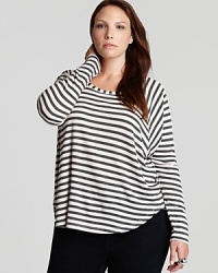 A study in contrasts, sharp stripes adorn the slouchy silhouette of a Splendid Plus top for an effortless look. A study in contrasts, sharp stripes adorn the slouchy silhouette of a Splendid Plus top for an effortless look.