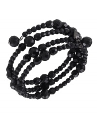 Let this sleek black bracelet coil around your wrist like a snake. Crafted by Carolee, this three row stretch bracelet features faceted jet beads set in hematite-plated mixed metal. Approximate diameter: 2-1/4 inches. Let this sleek black bracelet coil around your wrist like a snake. Crafted by Carolee, this three row stretch bracelet features faceted jet beads set in hematite-plated mixed metal. Approximate diameter: 2-1/4 inches.