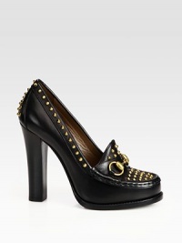 A Gucci horsebit loafer 60th anniversary detail tops this leather pump with goldtone metal studs. Stacked heel, 4½ (115mm)Leather upper with metal studsLeather lining and solePadded insoleMade in Italy A Gucci horsebit loafer 60th anniversary detail tops this leather pump with goldtone metal studs. Stacked heel, 4½ (115mm)Leather upper with metal studsLeather lining and solePadded insoleMade in Italy