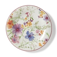 Crafted from premium porcelain, the Mariefleur salad plate boasts a refreshingly modern watercolor design with bright pinks, light greens and sunny yellows.