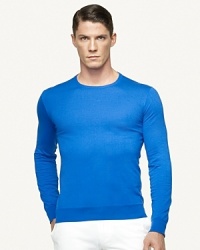 A jersey-knit crewneck is crafted from soft cotton and expertly tailored for a sleek, sophisticated silhouette. A jersey-knit crewneck is crafted from soft cotton and expertly tailored for a sleek, sophisticated silhouette.