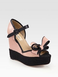 Elegant two-tone leather with an adjustable ankle strap, espadrille wedge and oversized bow adornment. Stacked rope wedge, 5 (125mm)Covered platform, 1 (25mm)Compares to a 4 heel (100mm)Leather upperLeather lining and solePadded insoleMade in ItalyOUR FIT MODEL RECOMMENDS ordering one half size up as this style runs small. Elegant two-tone leather with an adjustable ankle strap, espadrille wedge and oversized bow adornment. Stacked rope wedge, 5 (125mm)Covered platform, 1 (25mm)Compares to a 4 heel (100mm)Leather upperLeather lining and solePadded insoleMade in ItalyOUR FIT MODEL RECOMMENDS ordering one half size up as this style runs small.