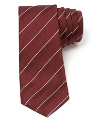 Armani Collezioni puts a modern spin on a simple stripe design. Featuring a skinny width and premier Italian silk, this piece is key to your successful look. Armani Collezioni puts a modern spin on a simple stripe design. Featuring a skinny width and premier Italian silk, this piece is key to your successful look.