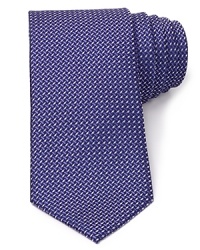A reserved tie in pure silk says you mean business and complements your dress shirting for a look of classic distinction. A reserved tie in pure silk says you mean business and complements your dress shirting for a look of classic distinction.