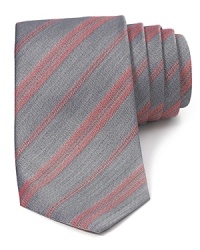 Rendered in a fine blend of cotton and silk for softness and refinement, this tie adds a fashionable touch to your professional shirting. Rendered in a fine blend of cotton and silk for softness and refinement, this tie adds a fashionable touch to your professional shirting.