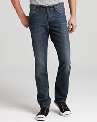 Faded for classic appeal, this handsome pair of jeans gives you a reliable look for your relaxed weekend wardrobe. Faded for classic appeal, this handsome pair of jeans gives you a reliable look for your relaxed weekend wardrobe.