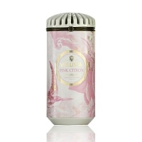 A luxury candle with a scent of ripe citron grapefruit with a juicy pink center, layered with tart cassis and a heart of subtle rose. A luxury candle with a scent of ripe citron grapefruit with a juicy pink center, layered with tart cassis and a heart of subtle rose.