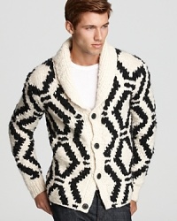 Redefine your winter style with this shawl collar cardigan featuring a striking pattern of repeating diamond shapes. A simple, refined presentation in soft merino wool. Redefine your winter style with this shawl collar cardigan featuring a striking pattern of repeating diamond shapes. A simple, refined presentation in soft merino wool.