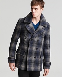 A striking plaid design catches the eye, revealing the classic peacoat structure of this handsome coat. Innovation and craftsmanship lead the way at the always superlative Burberry. A striking plaid design catches the eye, revealing the classic peacoat structure of this handsome coat. Innovation and craftsmanship lead the way at the always superlative Burberry.