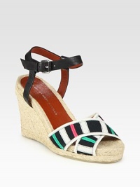 Multicolored grosgrain ribbon straps finished with an adjustable leather ankle strap and grounded by a classic espadrille wedge. Hemp wedge, 4 (100mm)Hemp platform, 1 (25mm)Compares to a 3 heel (75mm)Leather and grosgrain ribbon upperLeather lining and solePadded insoleImportedOUR FIT MODEL RECOMMENDS ordering one half size up as this style runs small. 