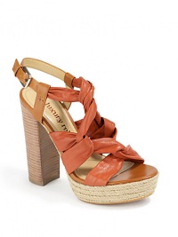 THE LOOKSoft leather straps crisscross on topAdjustable ankle strapPadded insoleStacked heel, 5(125mm)Rope-covered platform, 1(25mm)Compares to a 4 heel (100mm)THE MATERIALLeather and rope upperLeather liningRubber soleORIGINImported
