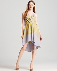 Rock one of the season's best trends with a touch of ladylike elegance in this BCBGeneration tribal print dress. The subtle pleats and high/low hem add movement, bring the luxe look to life. Rock one of the season's best trends with a touch of ladylike elegance in this BCBGeneration tribal print dress. The subtle pleats and high/low hem add movement, bring the luxe look to life.