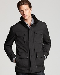 An effortless jacket from Tumi cuts a bold figure on the city streets or when you're out picking pumpkins at the local farm. An effortless jacket from Tumi cuts a bold figure on the city streets or when you're out picking pumpkins at the local farm.
